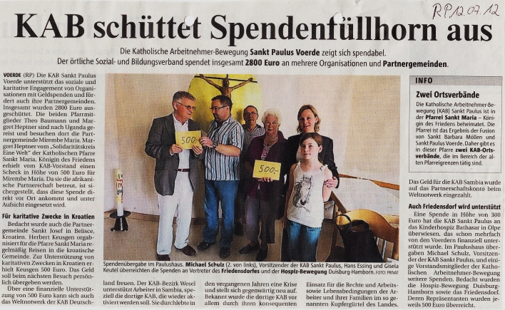 Spenden&uuml;bergabe in der RP -Klicke und Bild erscheint in Farbe und Gr&ouml;&szlig;er